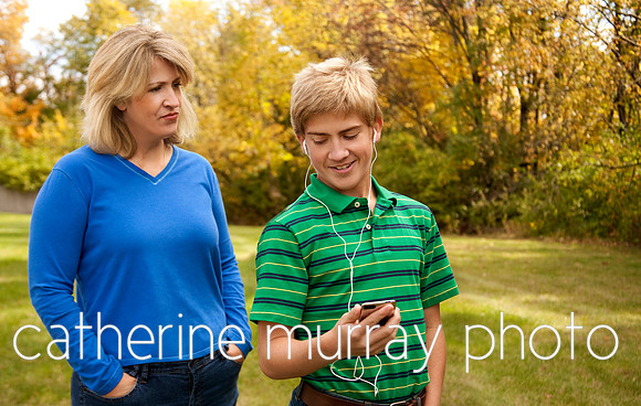 Son Ignoring Mother, Listening to Portable Music Player