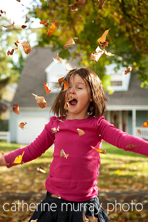 5 Year Old Playing with Leaves