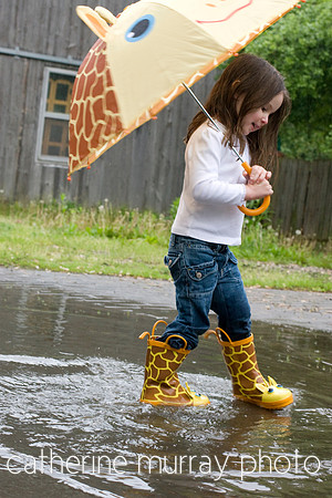 Girl Splashing in the Rain