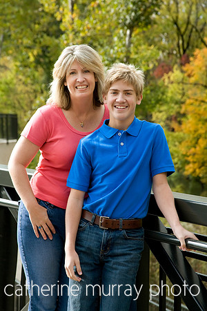 Mother and Son Leaning Against Railing