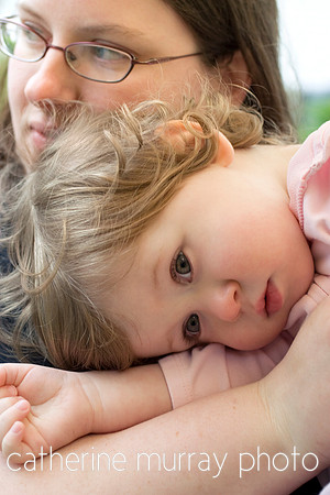 Tired Child with Comforting Mom